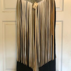 Silver fringe belt. Fits up to Sz 12